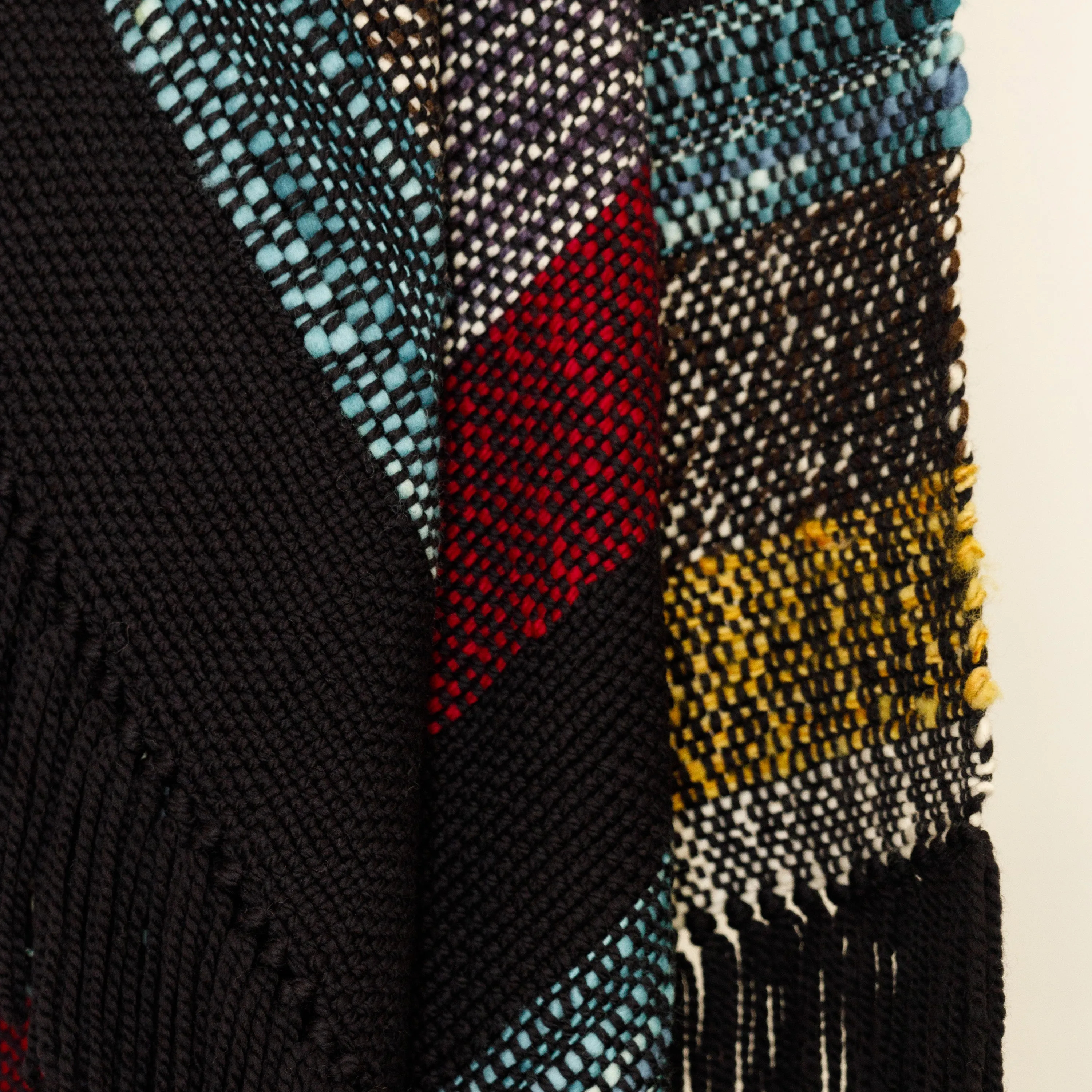 Handwoven Merino Wool Blanket – Black Base with Vibrant Stripes and Fringes