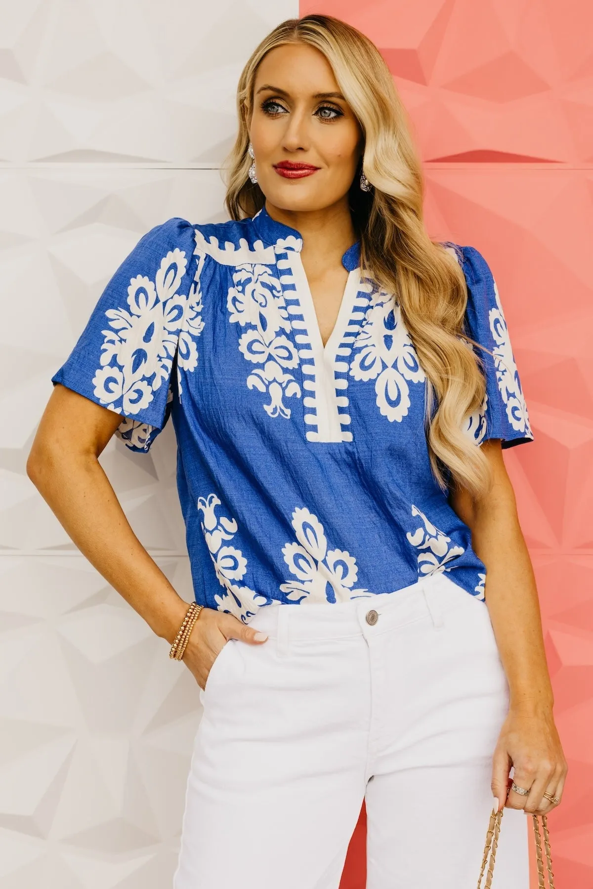 The Tessa Printed Notched V Neck Blouse