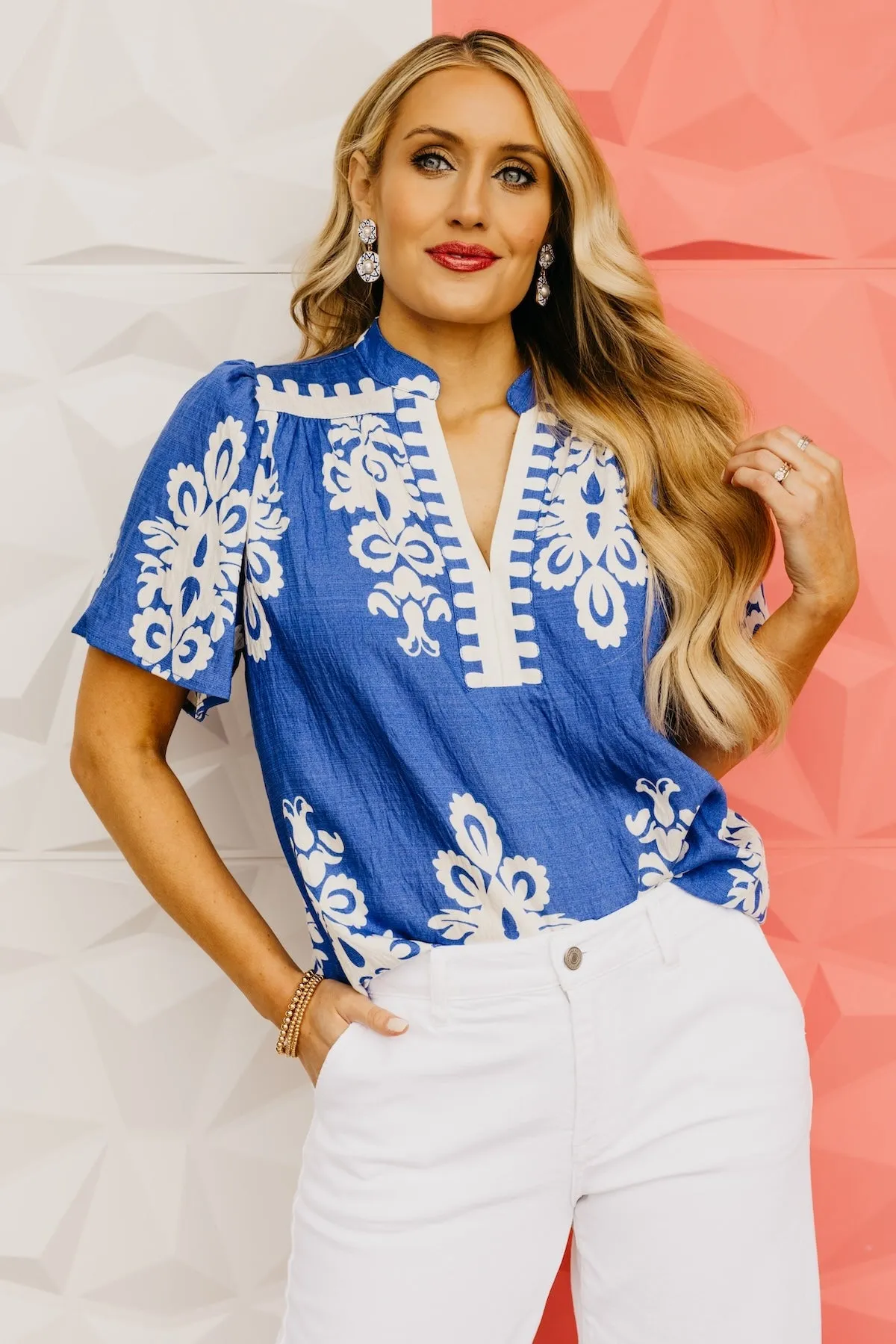 The Tessa Printed Notched V Neck Blouse