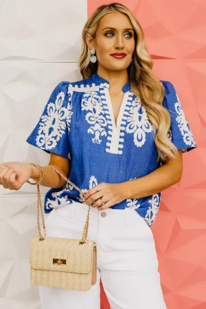 The Tessa Printed Notched V Neck Blouse